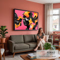 Quadro Decorativo Grande Rosto Abstrato Rosa para Sala | quadros decorativos para sala de estar | rosto abstrato preto com cabelo em chamas laranja sobre fundo rosa vibrante | em ambiente 3 | Porao dos Quadros