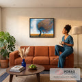 Quadro Decorativo Grande Árvores ao Vento para Sala Laranja | quadros decorativos para sala de estar | árvores estilizadas em linhas coloridas sobre campo de trigo dourado e céu azul em espiral | em ambiente 3 | Porao dos Quadros