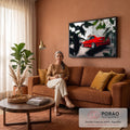 Carro esportivo vermelho rebaixado com rodas prateadas em rua entre folhas desfocadas, quadro decorativo