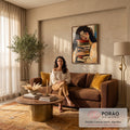 Quadro Decorativo Grande Mulher Dormindo para Sala Bege | quadros decorativos para sala de estar | mulher de cabelo escuro descansando sobre pilha de livros coloridos em pintura expressiva | em ambiente 3 | Porao dos Quadros