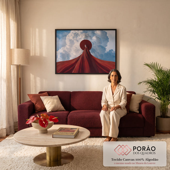 Quadro Decorativo Grande Mulher de Capa para Sala Vermelho | quadros decorativos para sala de estar | figura com rosto branco e capa vermelha diante de nuvens volumosas no céu azul | em ambiente 3 | Porao dos Quadros