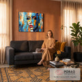 Quadro Decorativo Grande Rosto Laranja para Sala Azul | quadros decorativos para sala de estar | rosto feminino abstrato com textura rachada em azul, laranja e amarelo | em ambiente 3 | Porao dos Quadros