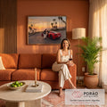 Quadro Decorativo Grande Casal e Carro para Sala Vermelho | quadros decorativos para sala de estar | casal se abraçando ao lado de carro esportivo vermelho em pôr do sol litorâneo com palmeiras | em ambiente 3 | Porao dos Quadros