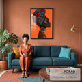 Quadro Decorativo Mulher Africana de Turbante Estampado | quadros decorativos para sala de estar | mulher negra de perfil com turbante estampado vermelho e azul sobre fundo laranja | em ambiente 3 | Porao dos Quadros