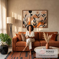 Quadro Decorativo Grande Flores Pretas para Sala Preto | quadros decorativos para sala de estar | flores pretas e pêssego estilizadas sobre colinas abstratas em laranja e bege | em ambiente 3 | Porao dos Quadros