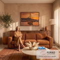 Quadro Decorativo Grande Veleiro Grego para Sala Laranja | quadros decorativos para sala de estar | veleiro de madeira ancorado em baía grega ao pôr do sol com farol ao fundo | em ambiente 3 | Porao dos Quadros