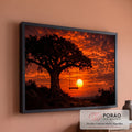 Árvore em silhueta com balanço de madeira diante do sol se pondo em céu laranja intenso, quadro decorativo