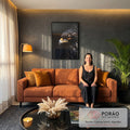 Quadro Decorativo Águia de Olhos Laranja em Fundo Preto | quadros decorativos para sala de estar | close de águia com olho laranja intenso e penas escuras sobre fundo preto | em ambiente 3 | Porao dos Quadros