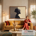 Perfil de mulher negra com turbante e brinco, metade em sombra e metade em luz sépia, quadro decorativo