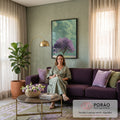 Quadro Decorativo Grande Árvore Florida Lilás para Sala Roxo | quadros decorativos | árvore com copa lilás sob céu verde e nuvem volumosa, campo florido ao redor | em ambiente 2 | Porao dos Quadros