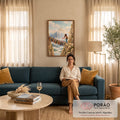 Quadro Decorativo Grande Ponte de Livros para Sala Azul | quadros decorativos para sala de estar | mulher atravessa ponte de livros entre penhascos com montanhas nevadas ao fundo | em ambiente 3 | Porao dos Quadros